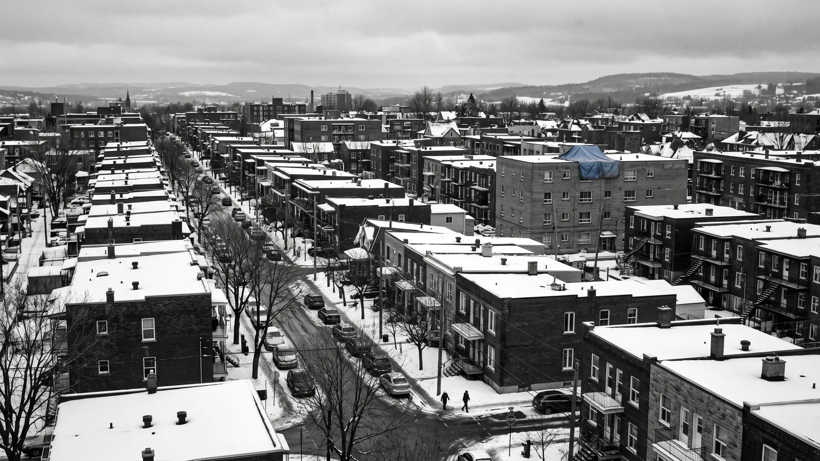 Row of brick triplexes in Sherbrooke illustrating quadrupled home repossessions
